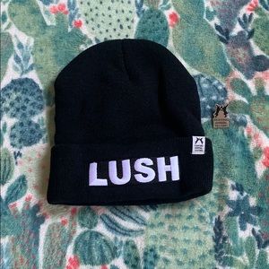 LUSH Cosmetics beanie and pin